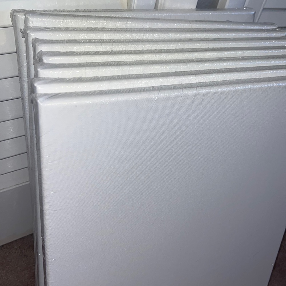 8 stretched canvases